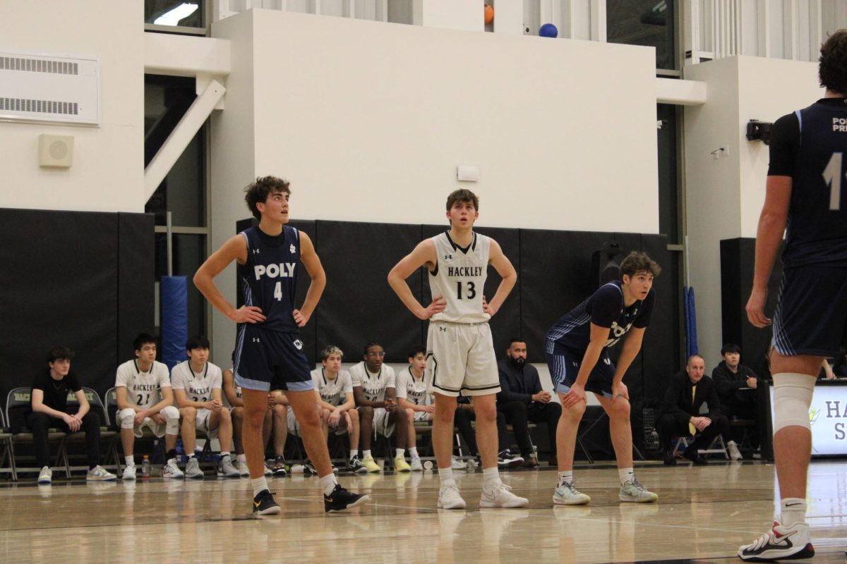 Senior Jack Perlman watches as his team shoots free throws. HBVS played Poly Prep at the Winter Sting.