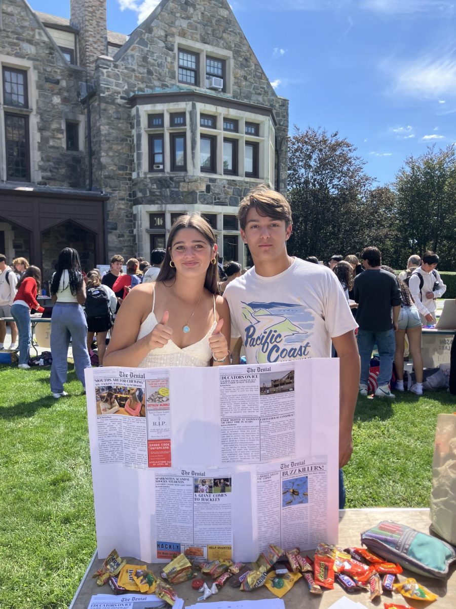 Andre McMahon and Cora McMahon are the leaders of the Denial. The Denial Club writes, edits, and prints Hackley's joke newspaper, similar in form to the Onion. To prep for the Club Fair, they made a poster featuring past copies of the Denial and also had candy and printed versions of their work to hand out to students.