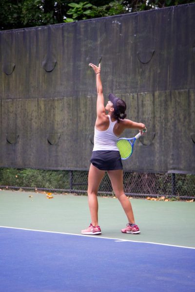 Lili Kanev is practicing at Hackley, training for an upcoming match. She practiced before school started, even though she had varsity practice later that day. "Every single day I have at least a two-hour practice and a workout 30 minutes to an hour," she said. (Photo courtesy of Lili Kanev)