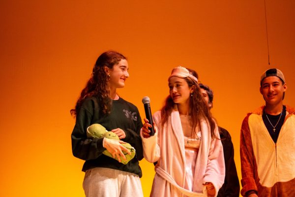 The Pedraza siblings, Emmerson (left) and Fiona (right), entered the duo competition at the very last minute. Getting up on stage before the groups started, Fiona called Emmerson down to the stage. They went as the Princess and the Pea, a popular children's fairy tale.