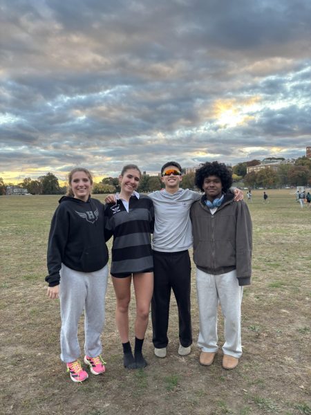 The Hackley Cross Country Captains, Sophie Frazier, Emma Curran, Nico Kim, and Brandon Acosta, gather before a meet showing shared support and unity in their individual competition. Through inclusive leadership and fun traditions, they've made connection a cornerstone of the team. (Photo Courtesy of Emma Curran)