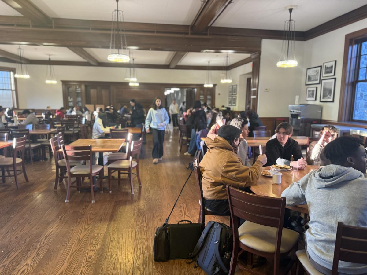 Students are enjoying breakfast in the Cafeteria. In the foreground, students Kubrick Croce, Elion Ashiru, Jasper Plunkett, James Eleck, and Xavier Payne were discussing their plans for the day with full plates.