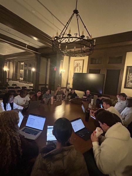 When Community Council has its meeting, they sit at a harkess table to communicate. First, they sit in a big group, then split up by grade. Once each grade has brainstormed, the group will come back and present their ideas about activities or events. Photo Courtesy: Pia Severin