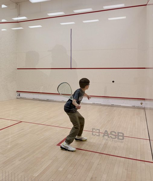 For the middle school squash games, players paired up based on their ranking to scrimmage.