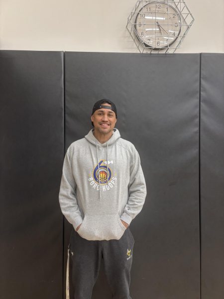 New girls varsity basketball coach Scott Kato heads the program after two years working at the JV level. His team 6th Borough Hoops also practices at Hackley throughout the year.