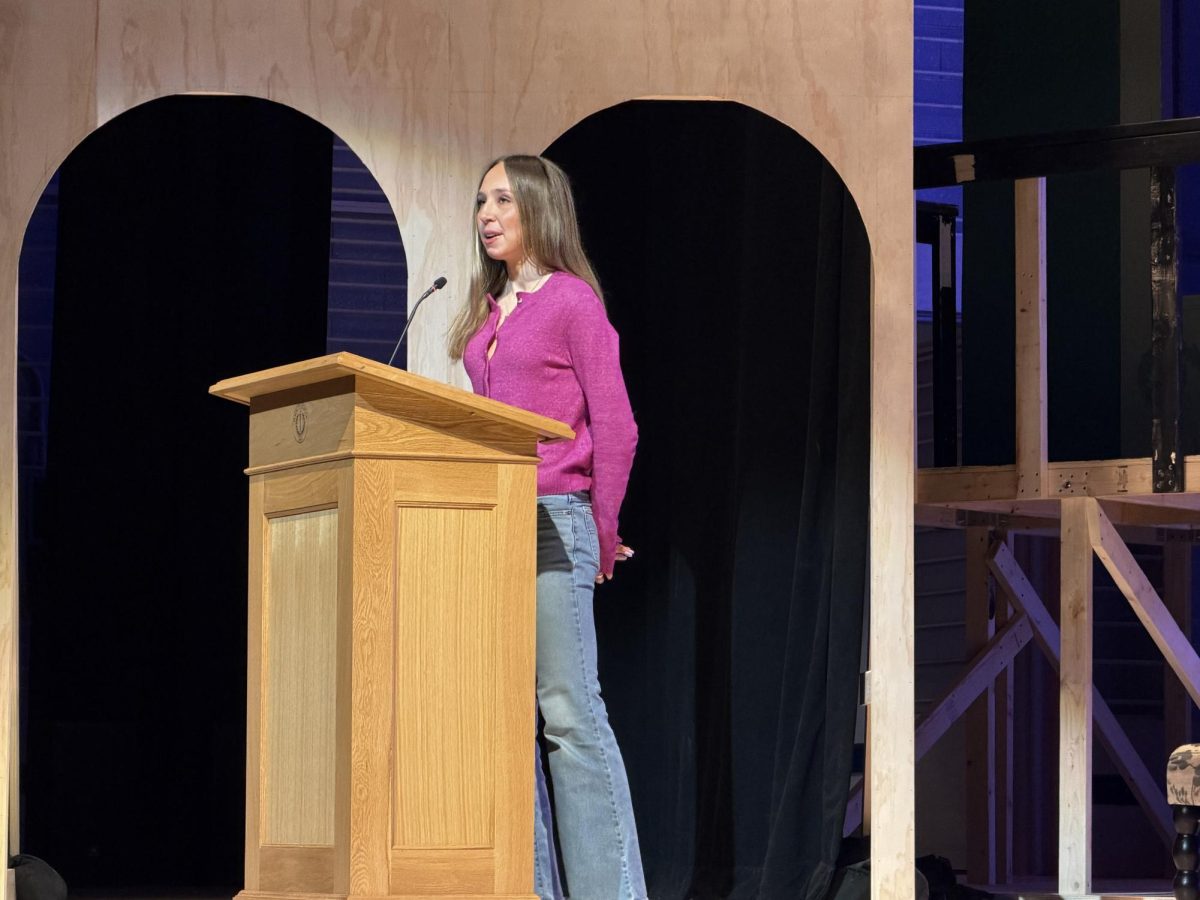 Macey shares her story in front of all her teachers and classmates. Part of her decision to do a senior spotlight was driven by the fact that Diller Hall was darker than the chapel, which made presenting less nerve-racking. "You can't really see people's individual faces," she said. 