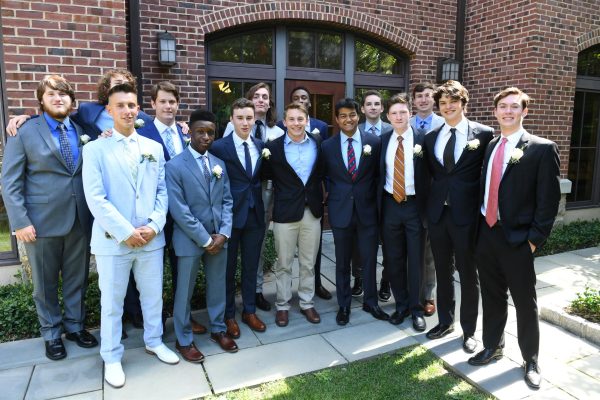 Homer Gere (2nd from the right) is at his graduation in 2018. Homer came to Hackley as a freshman in 2014. "I will always have a soft spot for Hackley," said Homer. (Credit: Hackley School Communications).