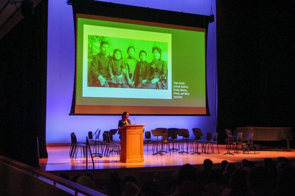 Prof. Dhillon spoke to the Upper School in an extended community time assembly, speaking case studies of how families affected current immigration law. The most notable was the Tape family (slide pictured here) which framed her the rest of her conversation to Diller Hall.